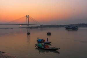 Sunset with boats on the River Hooghly